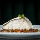 No te olvides de probar su delicioso plato de bacalao.